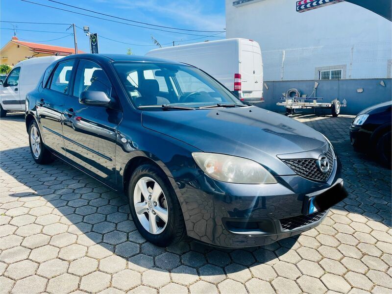 Cinza Usado 2007 Mazda 3 Exclusive | € 3.890 - Imagem 1/4