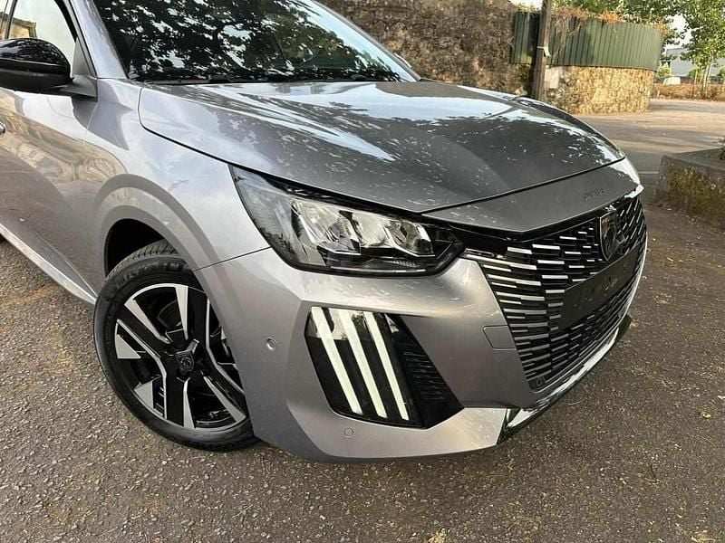 Cinza Novo 2025 Peugeot e-208 Allure Citadino | € 27.990 - Imagem 1/3