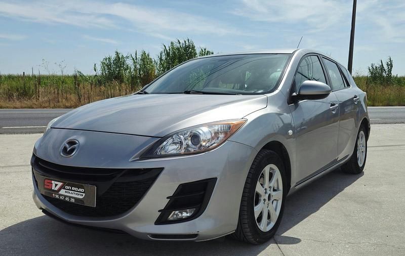 Cinza Usado 2012 Mazda 3 Exclusive Citadino | € 5.500 (Preço justo) - Imagem 1/4