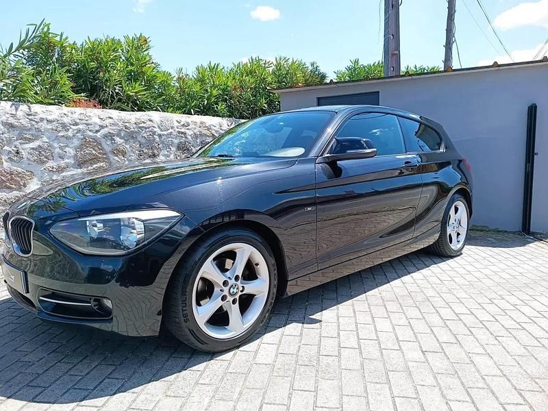 Preto Usado 2014 BMW 116 Efficient Dynamics Citadino | € 13.850 (Preço justo) - Imagem 1/4