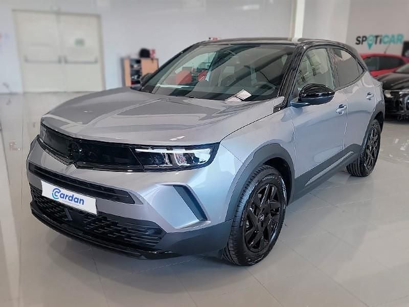 Cinzento Usado 2024 Opel Mokka SUV | € 25.000 - Imagem 1/4