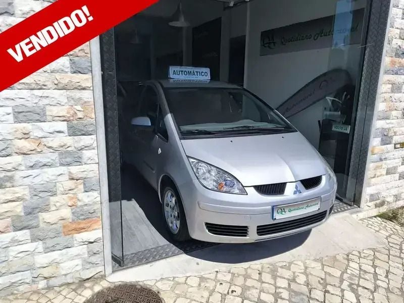 Cinzento Usado 2006 Mitsubishi Colt Invite | € 6.999 - Imagem 1/4