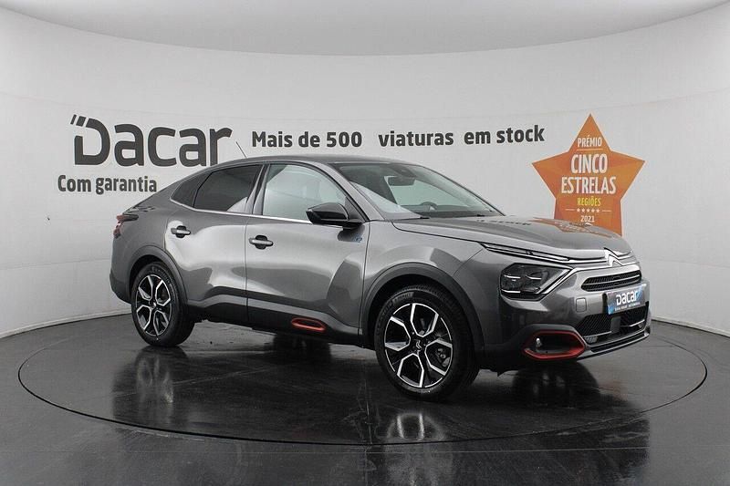 Cinza Usado 2023 Citroën e-C4 Feel Sedan | € 26.499 (Preço justo) - Imagem 1/4