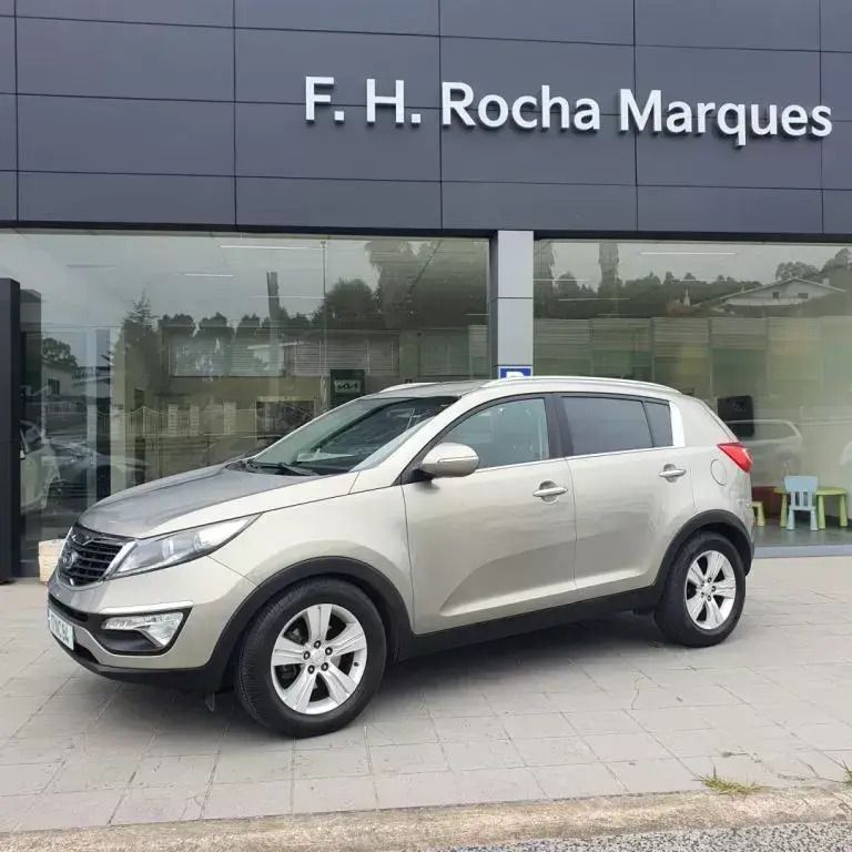 Castanho Usado 2012 Kia Sportage SUV | € 11.500 (Preço justo) - Imagem 1/4