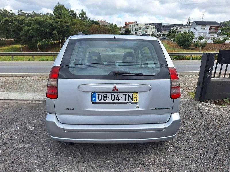 Usado Mitsubishi Space Star 102 HP (75 kW) 2002 Cinzento Van