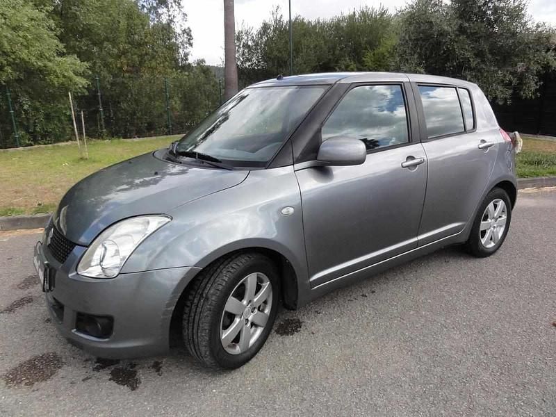 Cinzento Usado 2009 Suzuki Swift Citadino | € 5.500 (Preço justo) - Imagem 1/4