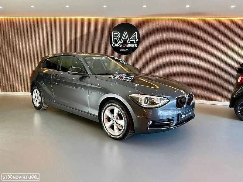 Cinza Usado 2013 BMW 116 Sport Line Citadino | € 13.490 - Imagem 1/4