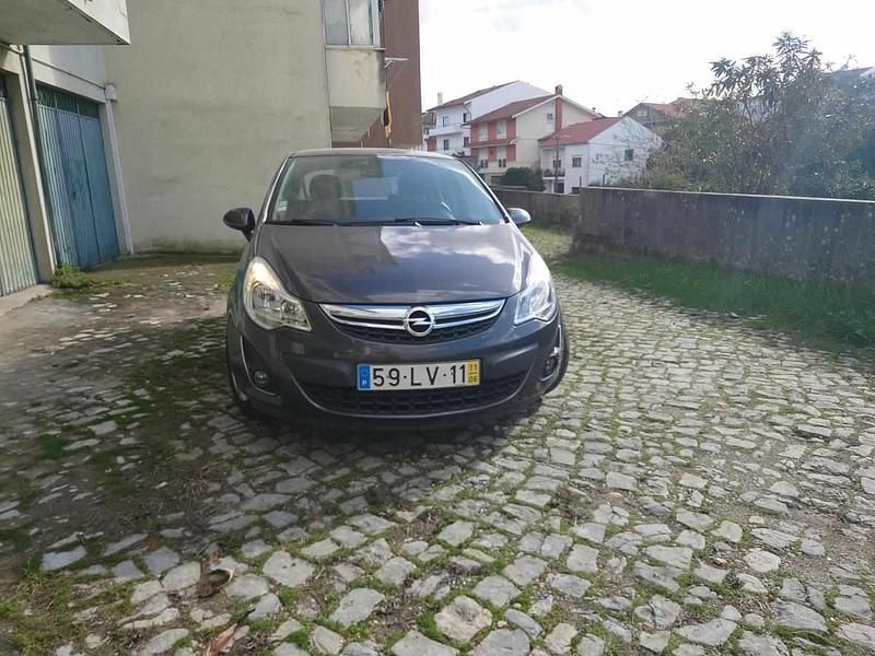 Cinzento Usado 2011 Opel Corsa Citadino | € 5.550 (Preço justo) - Imagem 1/4