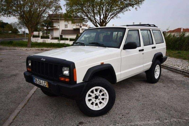 Branco Usado 1998 Jeep Cherokee Sport SUV | € 10.800 - Imagem 1/4