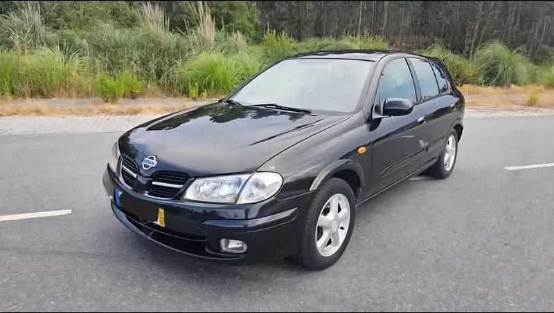 Preto Usado 2001 Nissan Almera | € 3.300 - Imagem 1/4