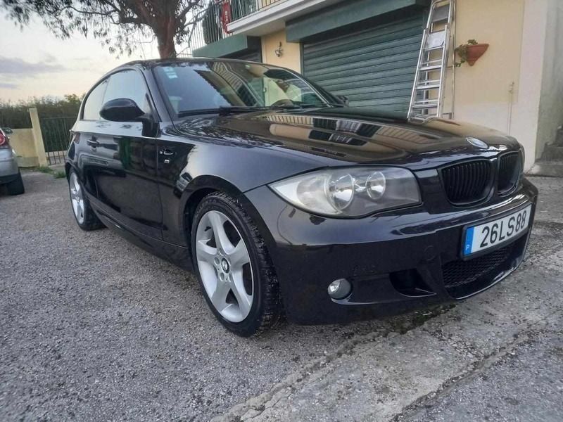 Preto Usado 2008 BMW 118 Citadino | € 8.750 - Imagem 1/4