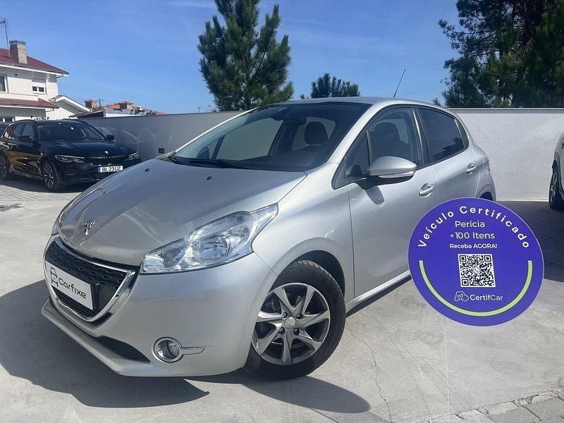 Cinza Usado 2014 Peugeot 208 Access Citadino | € 9.000 (Preço justo) - Imagem 1/4