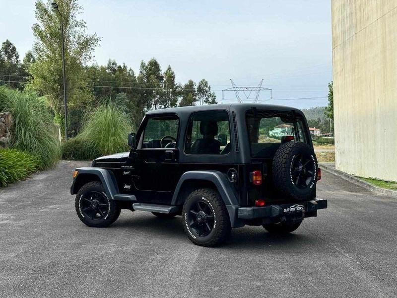 Usado Jeep Wrangler Sport 121 HP (88 kW) 1998 Preto SUV
