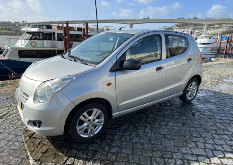 Cinzento Usado 2010 Suzuki Alto Citadino | € 4.450 - Imagem 1/4