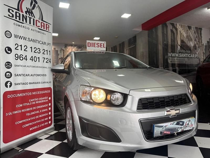 Usado Chevrolet Aveo LTZ 95 HP (69 kW) 2012 Cinza Sedan