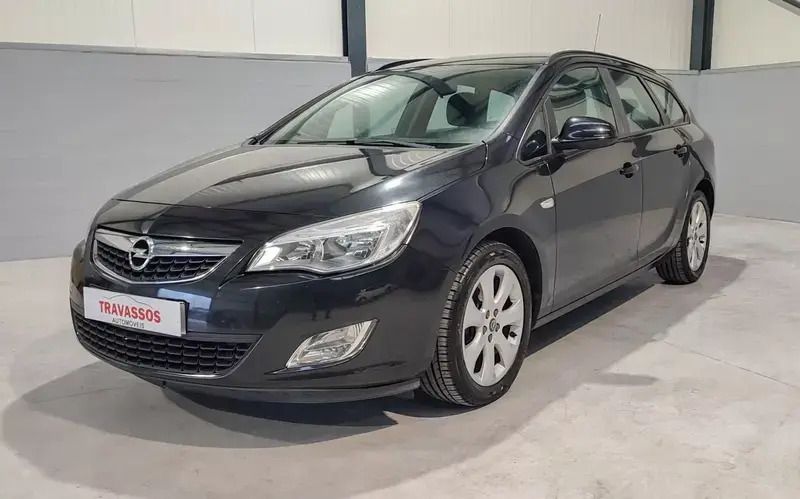 Preto Usado 2012 Opel Astra Enjoy Carrinha | € 11.500 - Imagem 1/4