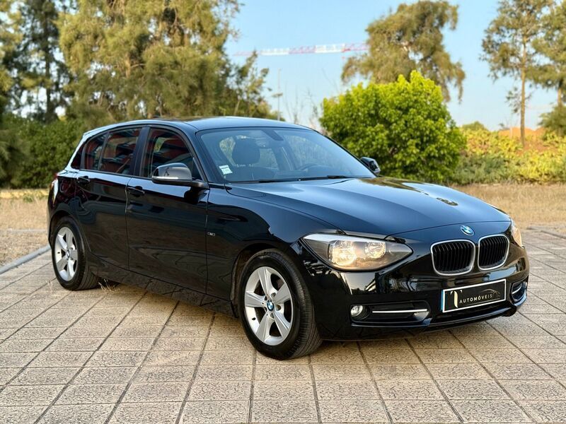 Preto Usado 2012 BMW 116 Efficient Dynamics Citadino | € 12.900 - Imagem 1/4
