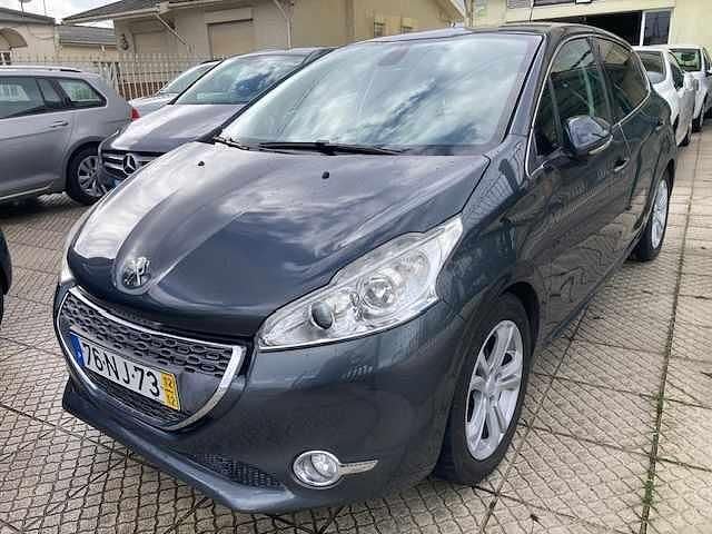 Usado Peugeot 208 114 HP (83 kW) 2012 Cinzento Citadino