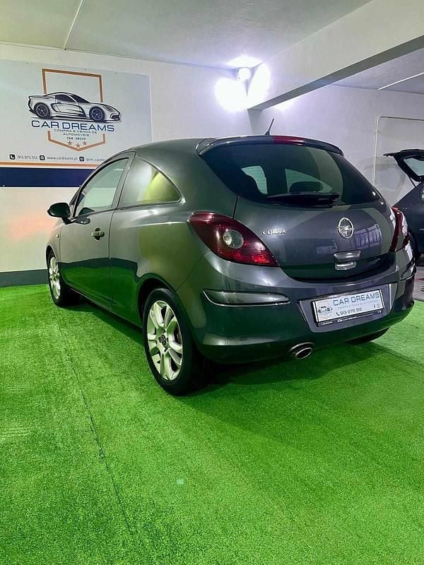 Usado Opel Corsa 86 HP (63 kW) 2011 Cinzento Citadino