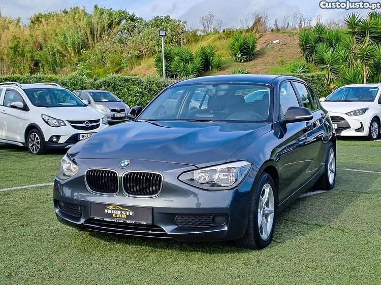 Cinza Usado 2012 BMW 116 Citadino | € 15.999 - Imagem 1/1