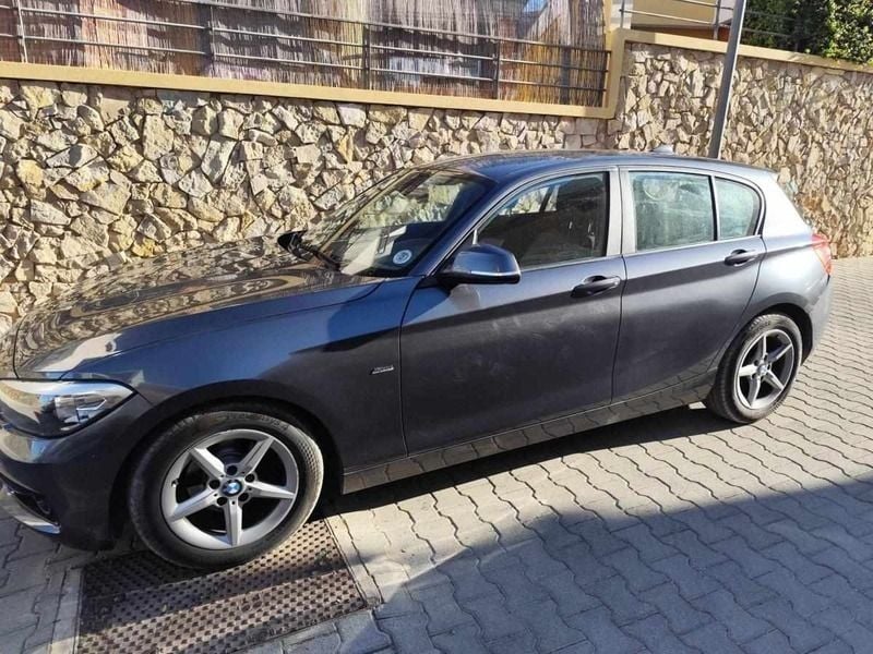 Cinzento Usado 2016 BMW 116 Citadino | € 8.950 - Imagem 1/4