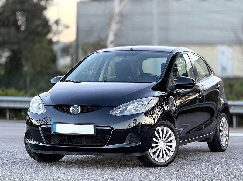 Preto Usado 2009 Mazda 2 Sedan | € 4.750 - Imagem 1/4