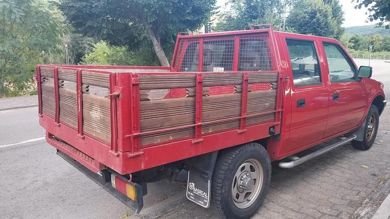 Usado Opel Campo 76 HP (55 kW) 1999 Vermelho Pickup