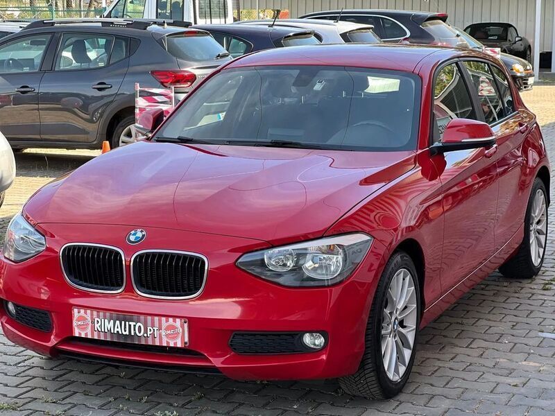 Vermelho Usado 2015 BMW 116 Efficient Dynamics Citadino | € 11.999 - Imagem 1/4