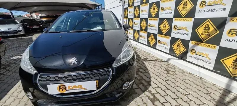 Preto Usado 2014 Peugeot 208 Citadino | € 13.980 - Imagem 1/4