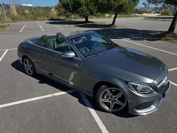 Cinza Usado 2017 Mercedes C220 AMG line Cabrios | € 32.950 - Imagem 1/4