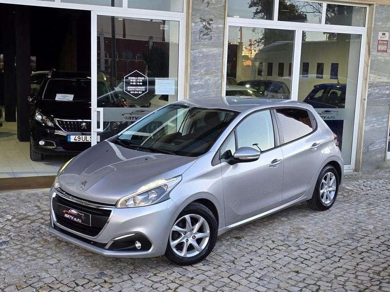 Usado Peugeot 208 Style 100 HP (73 kW) 2015 Cinzento Citadino