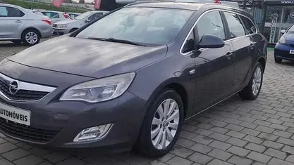 Cinzento Usado 2012 Opel Astra Carrinha | € 7.990 (Preço justo)