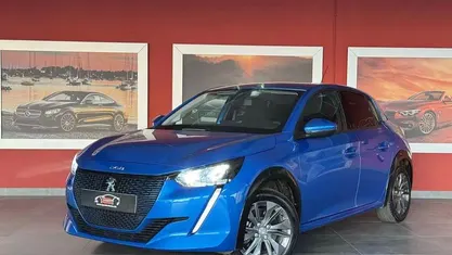 Azul Usado 2021 Peugeot e-208 Style Citadino | € 17.990 (Preço justo)