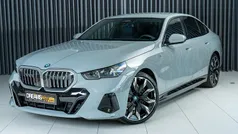 Cinza Usado 2023 BMW i5 Comfort Edition Sedan | € 57.800 (Preço justo)