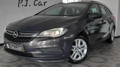 Usado Opel Astra 110 HP (80 kW) 2016 Cinzento Carrinha