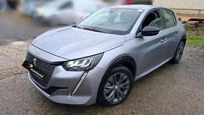 Cinza prata eelegance Usado 2022 Peugeot e-208 Active Citadino | € 18.990 (Preço justo)