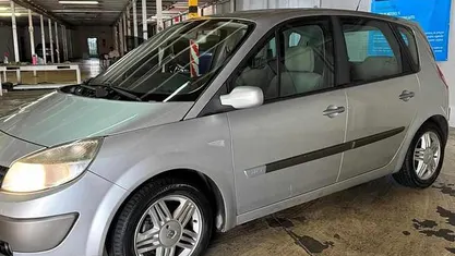 Usado Renault Scénic II 106 HP (77 kW) 2006 Cinzento Monovolume