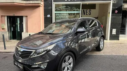 Usado Kia Sportage 115 HP (84 kW) 2011 Cinzento SUV