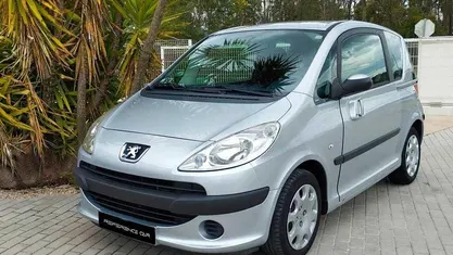 Usado Peugeot 1007 68 HP (50 kW) 2008 Cinzento Monovolume