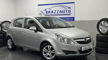 Usado Opel Corsa 90 HP (66 kW) 2010 Cinzento Citadino