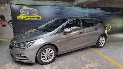 Usado Opel Astra Dynamic 110 HP (80 kW) 2017 Cinzento (metalizado) Citadino