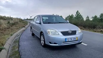 Usado Toyota Corolla 97 HP (71 kW) 2004 Cinzento Sedan