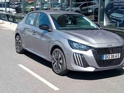 Cinzento Usado 2024 Peugeot e-208 Style Citadino | € 35.000