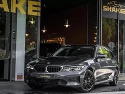 Cinzento Usado 2021 BMW 330e Luxury Line Carrinha | € 33.780 (Preço elevado)