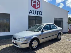 Cinza Usado 2000 Mazda 323F Sedan | € 2.900
