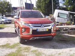 Laranja Usado 2020 Mitsubishi L200 Invite Pickup | € 28.990 (Bom preço)