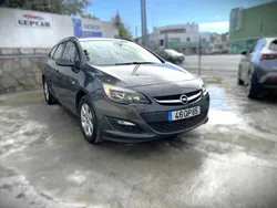 Cinzento Usado 2015 Opel Astra Carrinha | € 9.990 (Preço justo)