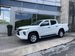 Branco cinzento, preto Usado 2022 Mitsubishi L200 Pickup | € 34.900 (Preço justo)