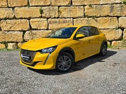 Amarelo Usado 2021 Peugeot e-208 Allure Citadino | € 19.500 (Preço elevado)