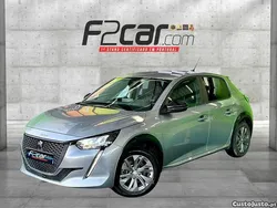 Cinza Usado 2023 Peugeot e-208 Active Citadino | € 19.990 (Preço justo)